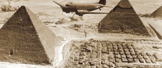 American transport plane flying over the pyramids of Egypt