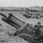 A battery of Soviet 122-mm M-30 howitzers, model 1938, fires at Berlin.