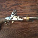 Photo of an antique flintlock pistol
