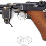Pistol Luger R.08 Parabellum with an under-barrel flashlight